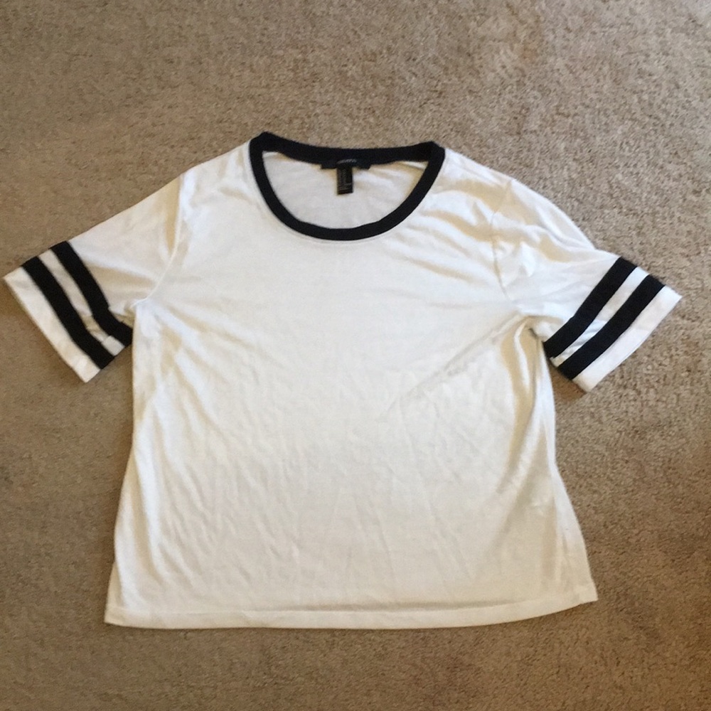 white and black short sleeve shirt